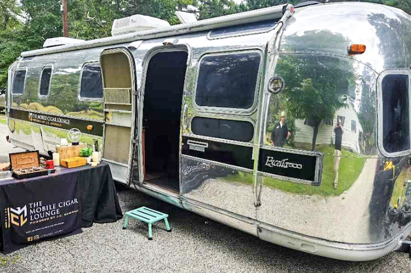 The Mobile Cigar Lounge's Airstream trailer at wedding reception